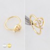 HEART-SHAPED DESIGN CENTERED WITH A MULTI CZ CROSS INLAID 316L SURGICAL STEEL NOSE HOOP RING HEART-SHAPED DESIGN CENTERED WITH A MULTI CZ CROSS INLAID 316L SURGICAL STEEL NOSE HOOP RING